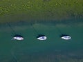 Three sailing boats mooring middle line in nature reserve Keyhaven natural harbor Royalty Free Stock Photo