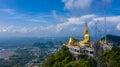 Aerial view Tiger Cave Temple, Buddha on the top Mountain with blue sky of Wat Tham Seua, Krabi,Thailand