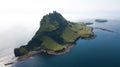 Aerial view of TindhÃÂ³lmur island hiding in the middle of the ocean