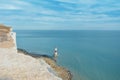 Aerial view to Beachy Head Lighthouse with blue turquoise water Royalty Free Stock Photo