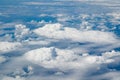 Aerial view to beautiful clouds from plane. Flight from Helsinki to Amsterdam Royalty Free Stock Photo