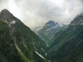 Aerial view to the beautiful mountain landscape. A panorama from the drone. Dombai Russia Royalty Free Stock Photo