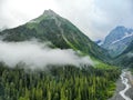 Aerial view to the beautiful mountain landscape. A panorama from the drone. Dombai Russia Royalty Free Stock Photo