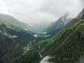 Aerial view to the beautiful mountain landscape. A panorama from the drone. Dombai Russia Royalty Free Stock Photo