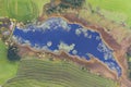 Aerial view to blue grosser eschacher weiher pond with green algae