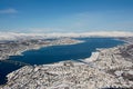 Aerial view to the city of Tromso, 350 kilometers north of the Arctic Circle, Norway. Royalty Free Stock Photo