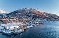 Aerial view to the city of Tromso and it`s marina in winter, North Norway. Royalty Free Stock Photo