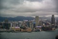 Hong Kong on rainy day with dark rain clouds, Victoria Harbour view from Hong Kong Island