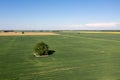 Aerial view to countryside with green agricultural fields and forests Royalty Free Stock Photo