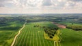 Aerial view to countryside with green agricultural fields and forests Royalty Free Stock Photo