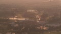 Aerial view to Golf course during sunrise and sun reflected from water in lakes timelapse. Royalty Free Stock Photo