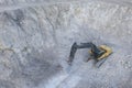 Aerial view to heavy mine bucket chain digger with shovel