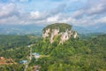 Aerial view to the Limestone hill Bukit Batu Kapur at Cinta Manis, Pahang, Malaysia. A mountain rock out of nowhere in the middle