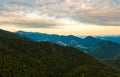 Aerial view to Mala Fatra mountains in Slovakia. Sunrise above mountain peaks and hills in far. Beautiful nature, vibrant colors. Royalty Free Stock Photo