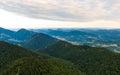 Aerial view to Mala Fatra mountains in Slovakia. Sunrise above mountain peaks and hills in far. Beautiful nature, vibrant colors. Royalty Free Stock Photo