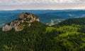 Aerial view to Mala Fatra mountains in Slovakia. Sunrise above mountain peaks and hills in far. Beautiful nature, vibrant colors. Royalty Free Stock Photo