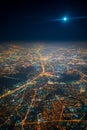 Aerial view to night city from the plane