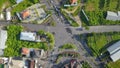 Aerial view to road congestion in front of street crossing, approaching intersection. Jalan Sunset Road at the Kuta