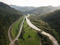 Aerial view to road with moutains captured from above