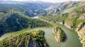 Aerial view to viewpoint Vidikovac Molitva, with curved meanders in canyon of Uvac river, Serbia Royalty Free Stock Photo