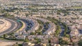 Aerial view to villas and houses with Golf course with green lawn and lakes timelapse Royalty Free Stock Photo