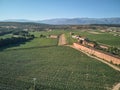 Aerial view of tobacco growing fields in La Vera, Extremadura. Spain. In the background the Sierra de Gredos