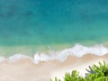 Aerial view top view Beautiful topical beach with white sand coconut palm trees and sea. Top view empty and clean beach. Waves Royalty Free Stock Photo
