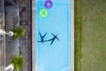 Aerial view or top view of children are swimming in swimming pool Royalty Free Stock Photo