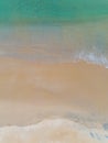 Aerial view Top Down of Beautiful sea summer or beach and tropical sea background,soft turquoise ocean wave crashing on sandy Royalty Free Stock Photo