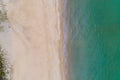 Aerial view Top down of beautiful tropical beach Aerial drone shot of turquoise sea water surface at the beach space for text and Royalty Free Stock Photo