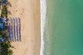 Aerial view Top down Flying above turquoise ocean and waves washing sandy beach in beautiful island Summer day Royalty Free Stock Photo