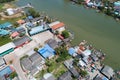 Aerial view top down view of a group of fishing vessels or boats in a fishing village Drone view above the fishing village