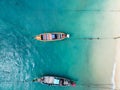 Aerial view top down longtail fishing boats at the sea in Phuket Thailand Royalty Free Stock Photo