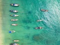 Aerial view top down longtail fishing boats at the sea in Phuket Thailand Royalty Free Stock Photo