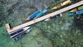 Aerial view of top down picture of colorful wooden boats. Boats at the pier. Lampung, Indonesia Jan 20, 2021