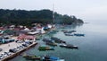 Aerial view of top down picture of colorful wooden boats. Boats at the pier. Lampung, Indonesia Jan 20, 2021