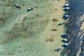 Aerial view top down of Thai traditional longtail fishing boats in the tropical sea beautiful beach in phuket thailand Royalty Free Stock Photo