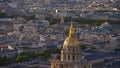 Aerial view of the top of Les Invalides dome with golden colored cupola located in the dense historic center of Paris. Royalty Free Stock Photo