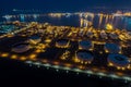 Aerial view or top view night light oil terminal is industrial facility for storage of oil and petrochemical. oil manufacturing Royalty Free Stock Photo