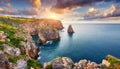 Aerial view top seashore, rocky coast, waves crashing on rock cliff. Blue ocean surface sunny summer Royalty Free Stock Photo