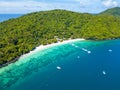 Aerial view or top view of tropical island beach with clear water at Banana beach, Coral Island, Koh Hey, Phuket