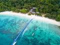 Aerial view or top view of tropical island beach with clear water at Banana beach, Coral Island, Koh Hey, Phuket