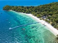 Aerial view or top view of tropical island beach with clear water at Banana beach, Coral Island, Koh Hey, Phuket