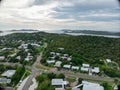 Aerial view of Tories Straight Queensland showing houses and ocean