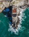 Aerial view of Torre Normanna, a medieval tower along the coast near Amalfi, Amalfi coast, Salerno, Maiori, Italy