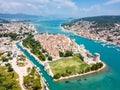 Aerial view of touristic old Trogir, historic town on a small island and harbour on the Adriatic coast in Split-Dalmatia, Croatia.