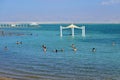 Aerial view of tourists floating over the Dead sea in Ein Bokek an hotel and resort district in Israel