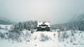 Aerial view of tourists and mountain chalet by the Morskie Oko or Sea Eye lake Royalty Free Stock Photo