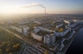 Aerial view of town in autumn at sunset. Royalty Free Stock Photo