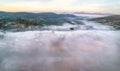 Aerial view of the town in the early morning mist Royalty Free Stock Photo